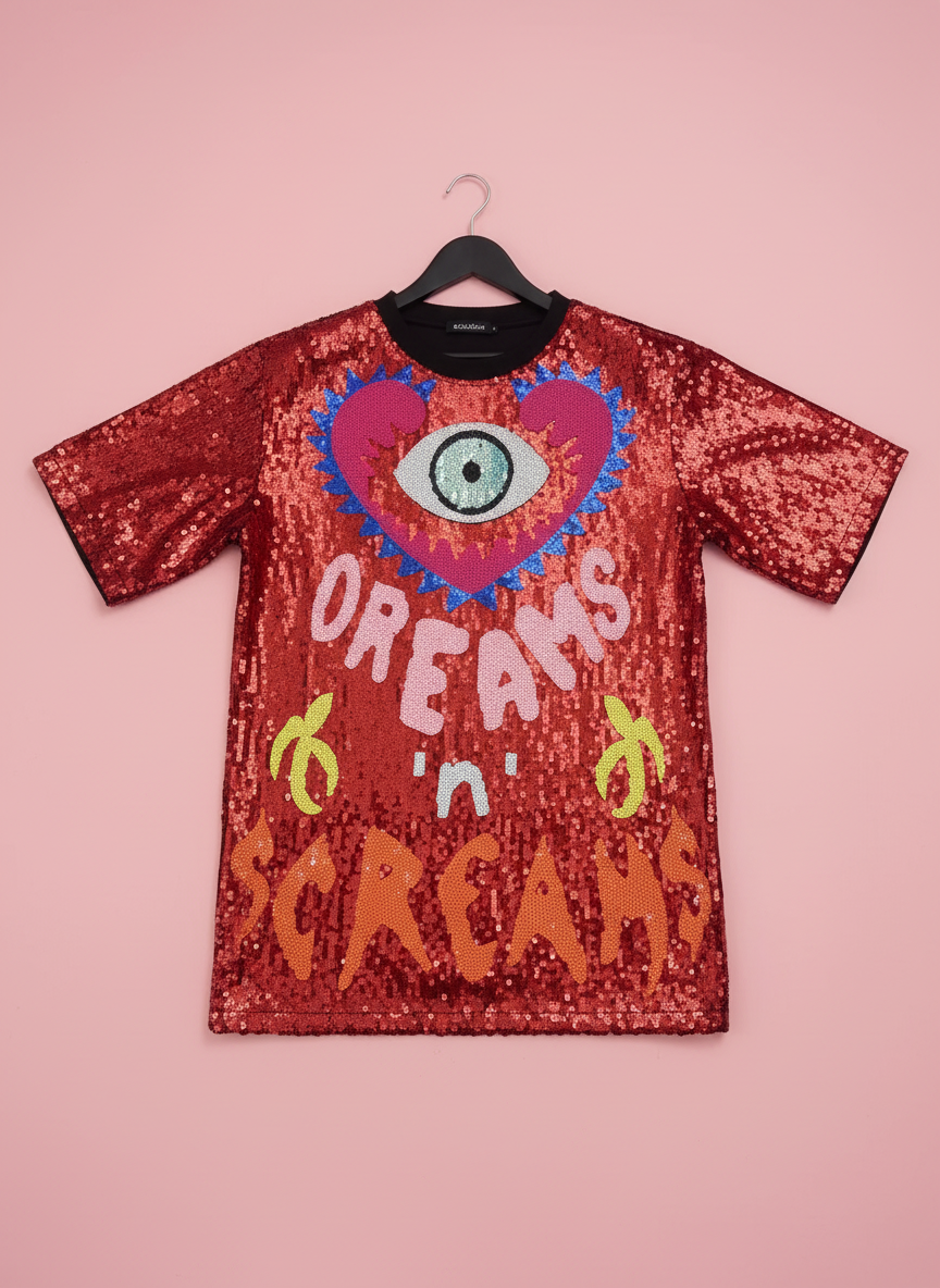 Red DREAMS in SCREAMS sequinned dress with pink background